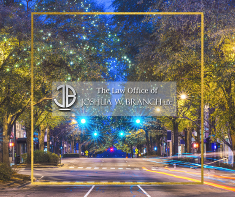 Athens, GA nightscape with firm logo in the middle